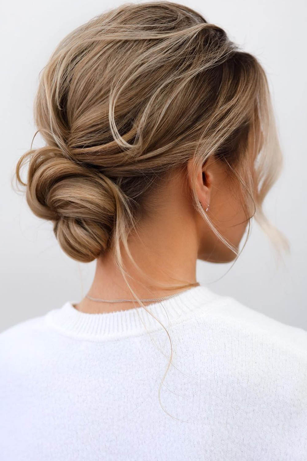 Messy Blonde Low Updo