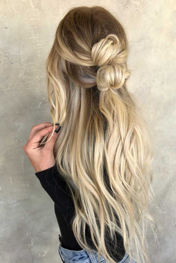 In case your hair is fine and you do not want to apply tons of styling products to make it voluminous, consider half-up bun hairstyles