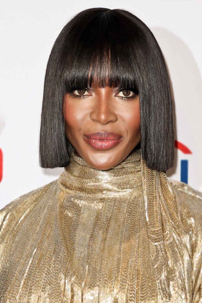 Naomi Campbell: Sleek Blunt Bob With Thick Bangs #hairstylesforwomenover50
